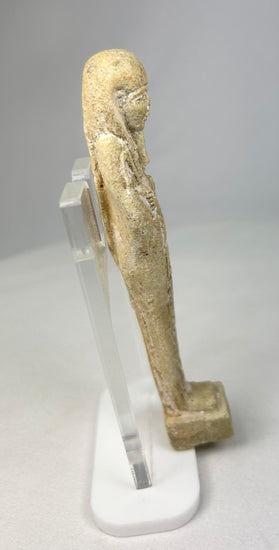 Full-length view of a Late Period ushabti showing carved garment details