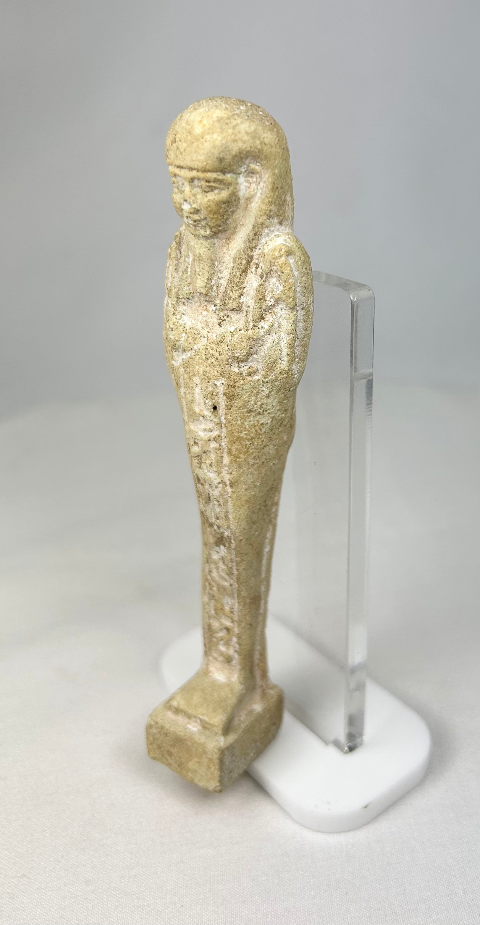 Top-to-bottom view highlighting surface texture of a carved ushabti figurine