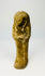 Weathered sandstone ushabti statue standing upright for product photography.