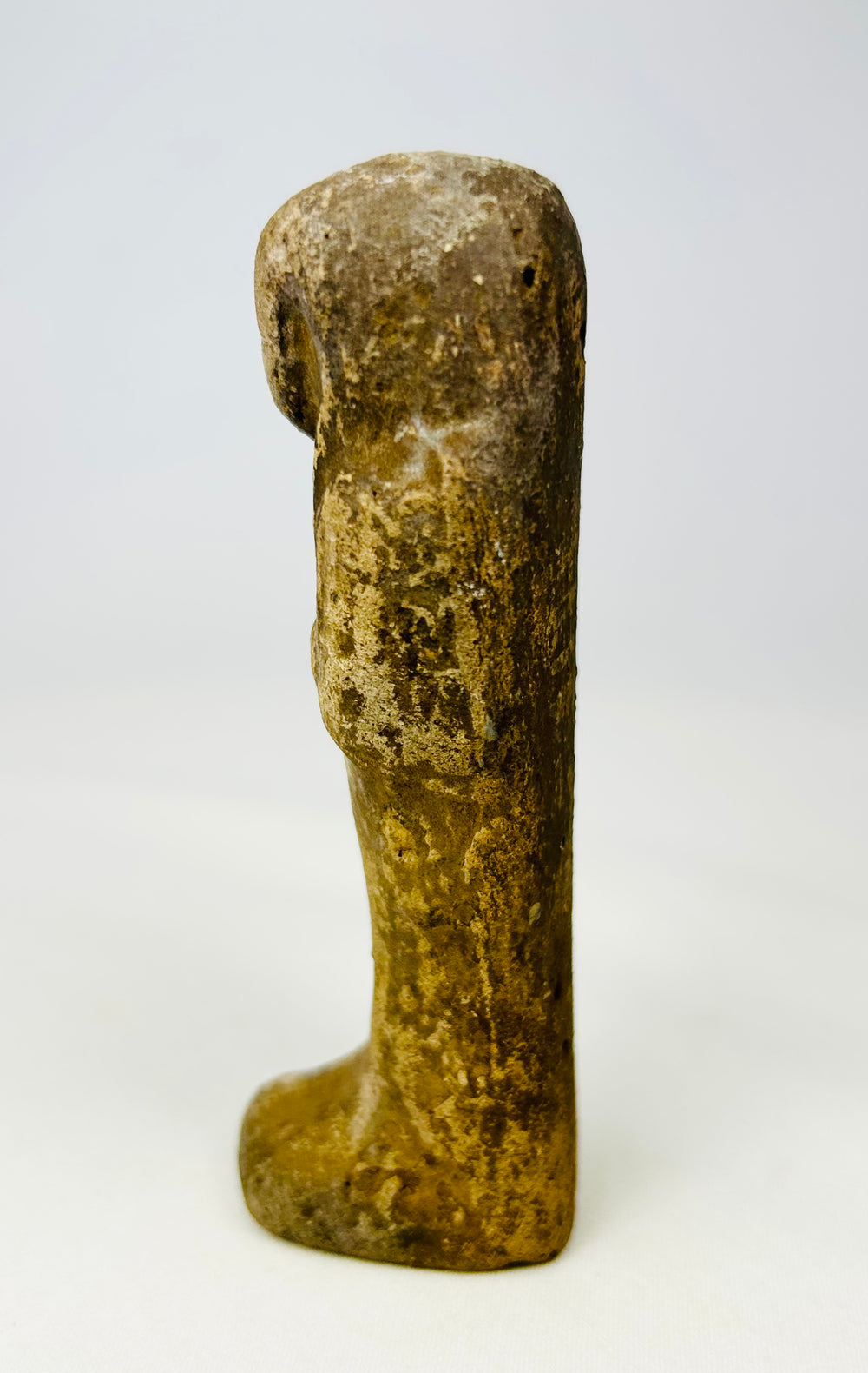 Three-quarter angle of ancient Egyptian funerary ushabti statue.