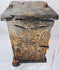 Indian carved wood cabinet decorated with scrolling vines, leaves, and blossoms