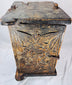 Indian carved wood cabinet decorated with scrolling vines, leaves, and blossoms