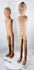 Western Han male tomb figure with modeled face, topknot, and shoulder apertures