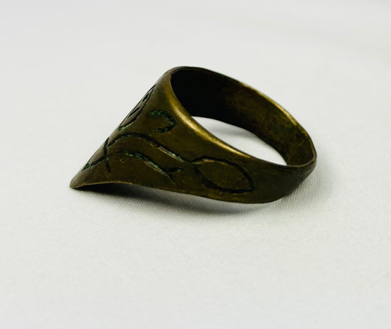 Large brass archery release ring with patina