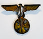 Reverse of Kriegsmarine cap insignia showing long steel attachment pin