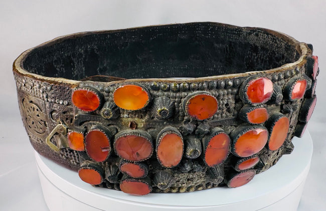 Antique Southern Russian bridal belt with hand-fitted Cornelian stones, riveted brass construction, and aged ceremonial patina.