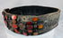 Close-up of orange Cornelian gemstones set into an ornate Jewish bridal belt dating to the 17th–18th century.