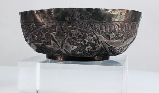 Antique Seljuk silver vessel highlighting intricate engraved metalwork and a naturally aged silver patina.