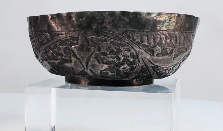 Antique Seljuk silver vessel highlighting intricate engraved metalwork and a naturally aged silver patina.