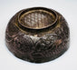 Seljuk-period silver unguent bowl displaying engraved decoration, aged silver surfaces, and a compact 2.5-inch diameter form.