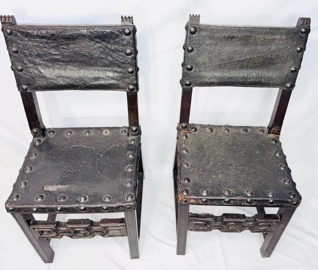 Antique Spanish walnut chairs with studded leather seats and backs