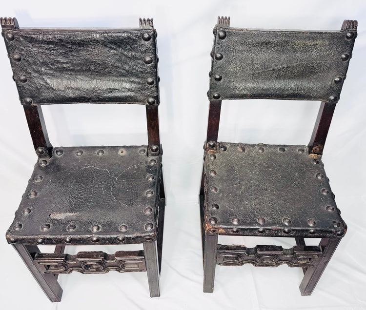 Antique Spanish walnut chairs with studded leather seats and backs