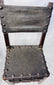 Detail of craquelure and historic wear on 17th-century chair leather