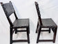 Matched Spanish Baroque side chairs displaying centuries-old patina and wear