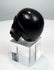Rear view showing the rounded cranium of the miniature carved skull