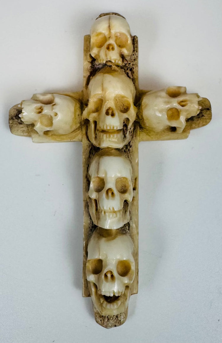 European Christian devotional bone cross carved with six skulls