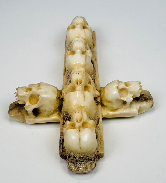 Detailed bone carving with recessed skull eyes, nasal cavities, and teeth