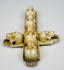 Detailed bone carving with recessed skull eyes, nasal cavities, and teeth