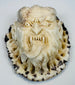 Compact Japanese antler oni plaque with retained dark outer cortex