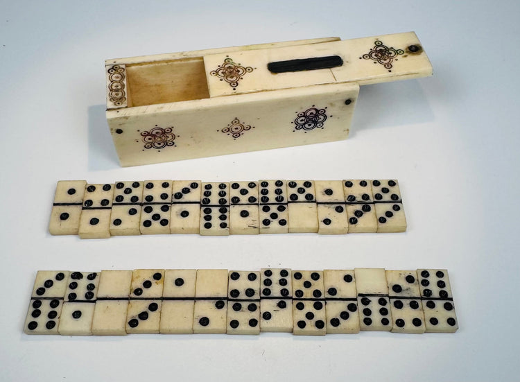 Early 19th-century European bone dominoes in a fitted travel case