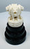 Indian miniature sculpture with four Asiatic lions and wheel motifs