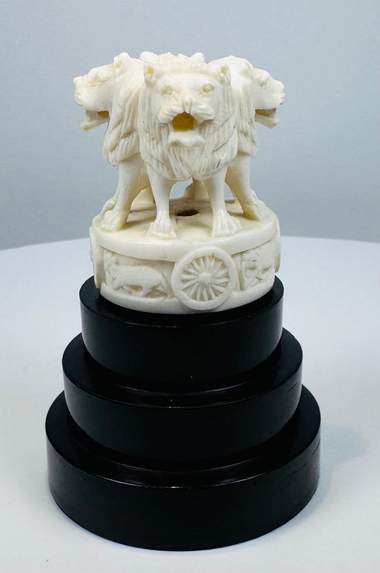 Hand-carved four-lion Ashoka sculpture in pale organic material