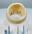 European memento mori bone ring with warm cream coloration and aged patina