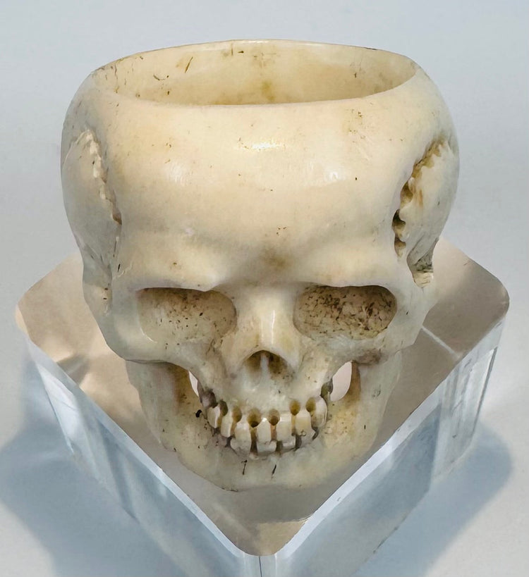 Oversized antique skull ring displaying openwork jaw and temple details