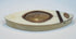 Detail of shield-shaped metal ornament on Georgian bone toothpick case