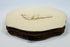 Compact 19th-century carved bone purse with original-style metal clasp and aged patina