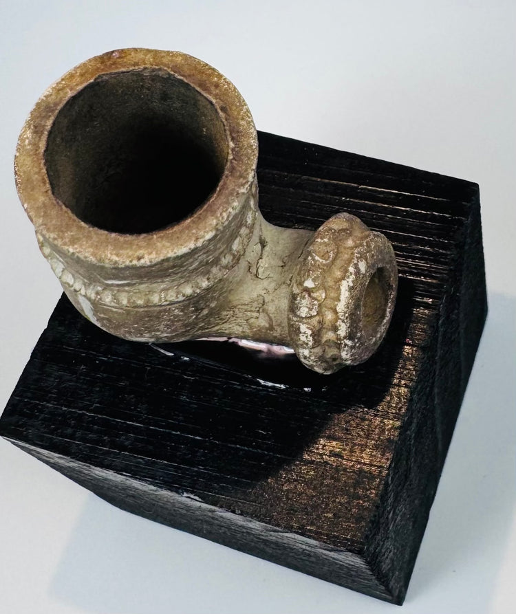 African pottery smoking bowl with darkened chamber from historical use