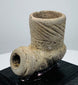 Open stem socket on a carved stone elbow pipe from ancient North America