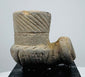 Archaeological North American smoking pipe with mineral deposits and worn carved details
