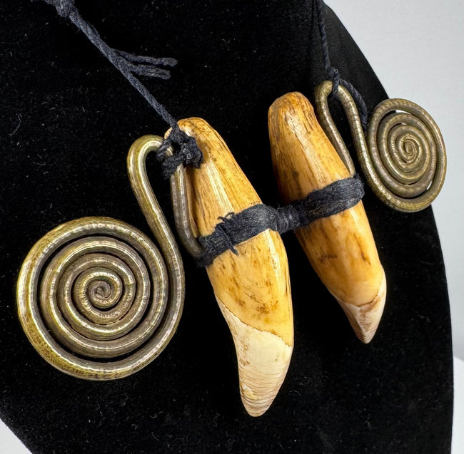 Chang Naga necklace ornament with paired teeth, brass wire and textile binding
