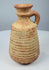 Roman–Late Antique terracotta vessel with narrow neck and outward-flaring mouth