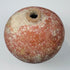 Fragmentary Roman pottery tettina with compact spherical body and weathered red-orange surface