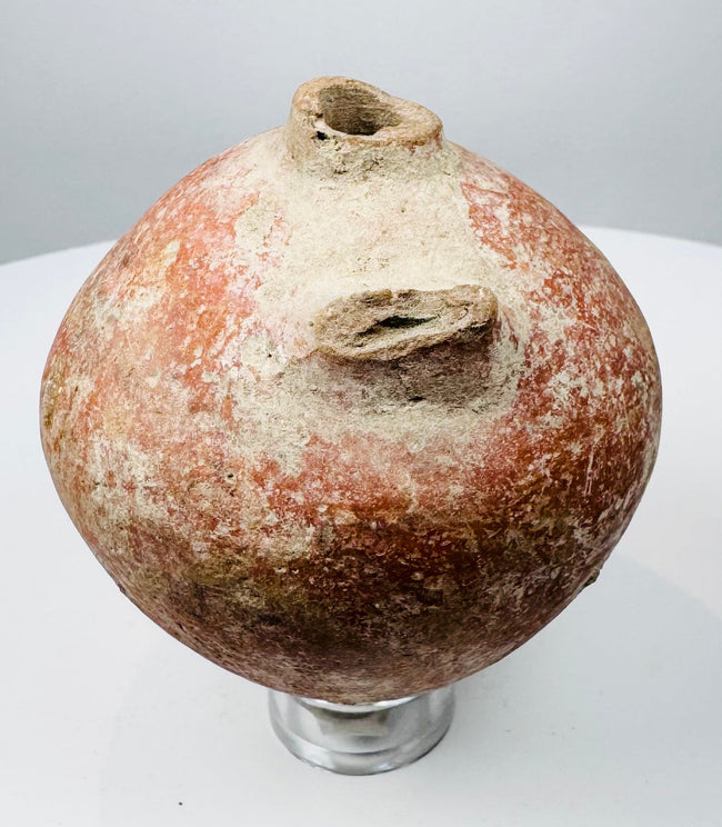 Roman Imperial terracotta tettina with red-orange slip and surviving side handle