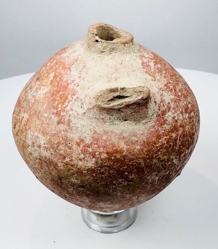 Roman Imperial terracotta tettina with red-orange slip and surviving side handle