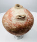 Roman Imperial terracotta tettina with red-orange slip and surviving side handle