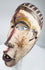 Lower Congo wooden mask with surviving white, yellow, red-purple and brown pigments