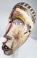 Lower Congo wooden mask with surviving white, yellow, red-purple and brown pigments