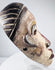 Expressive Yombe cultural mask with cream-colored face and dark contrasting details