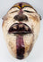 Reverse view of a hollowed African wooden mask with visible hand-tool marks