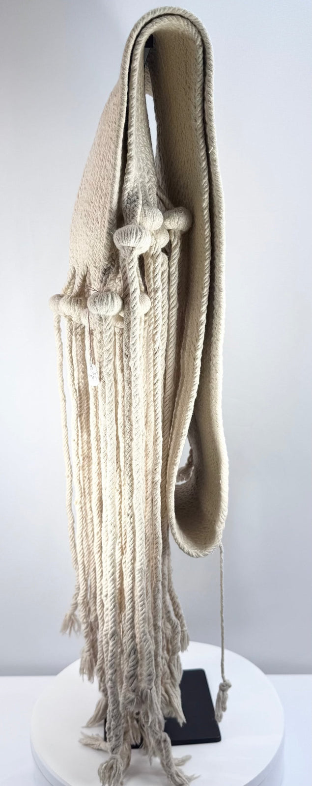 Detailed view of age-related wear, staining and minor fraying on a Pueblo textile