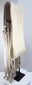 Side view of a long Hopi-style cotton sash showing its sculptural tassel arrangement