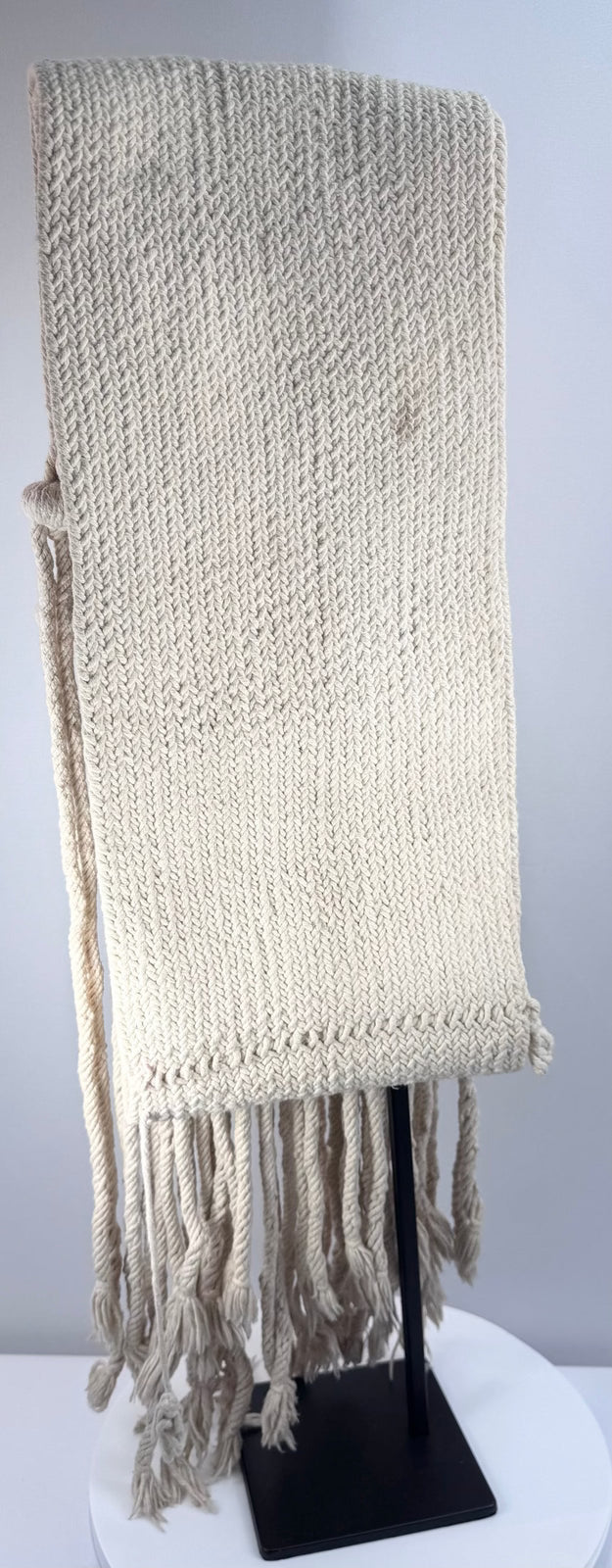 Hand-spun cotton rain sash with extensive fringe and suspended ritual tassels