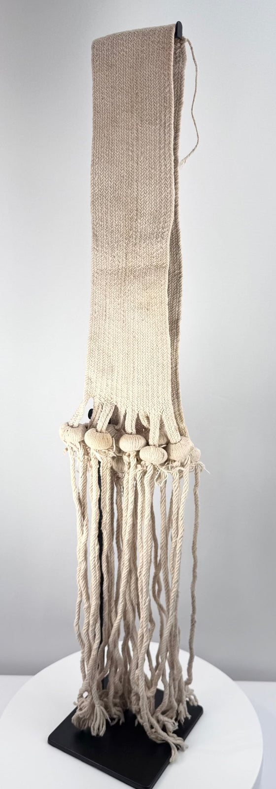 Southwestern Pueblo child’s rain sash with long suspended cotton tassels