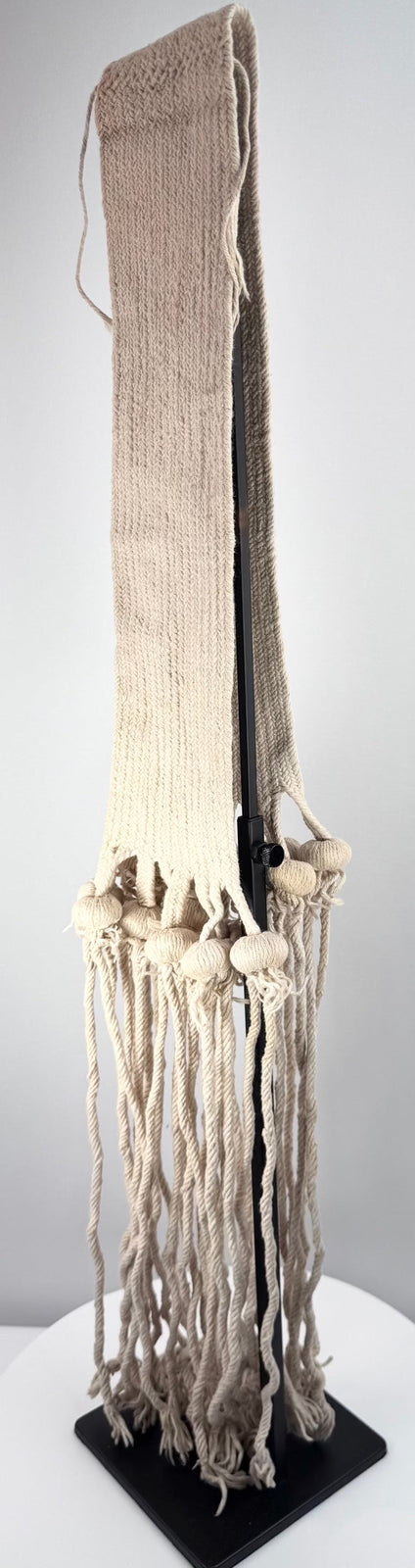 Early 20th-century ceremonial cotton sash with age-related staining and minor fraying