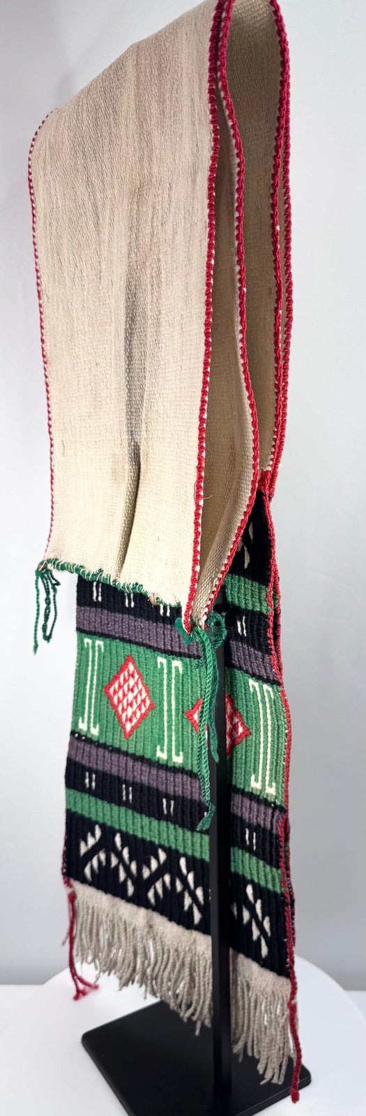 Mid-century American Southwest textile with geometric motifs and age-related patina