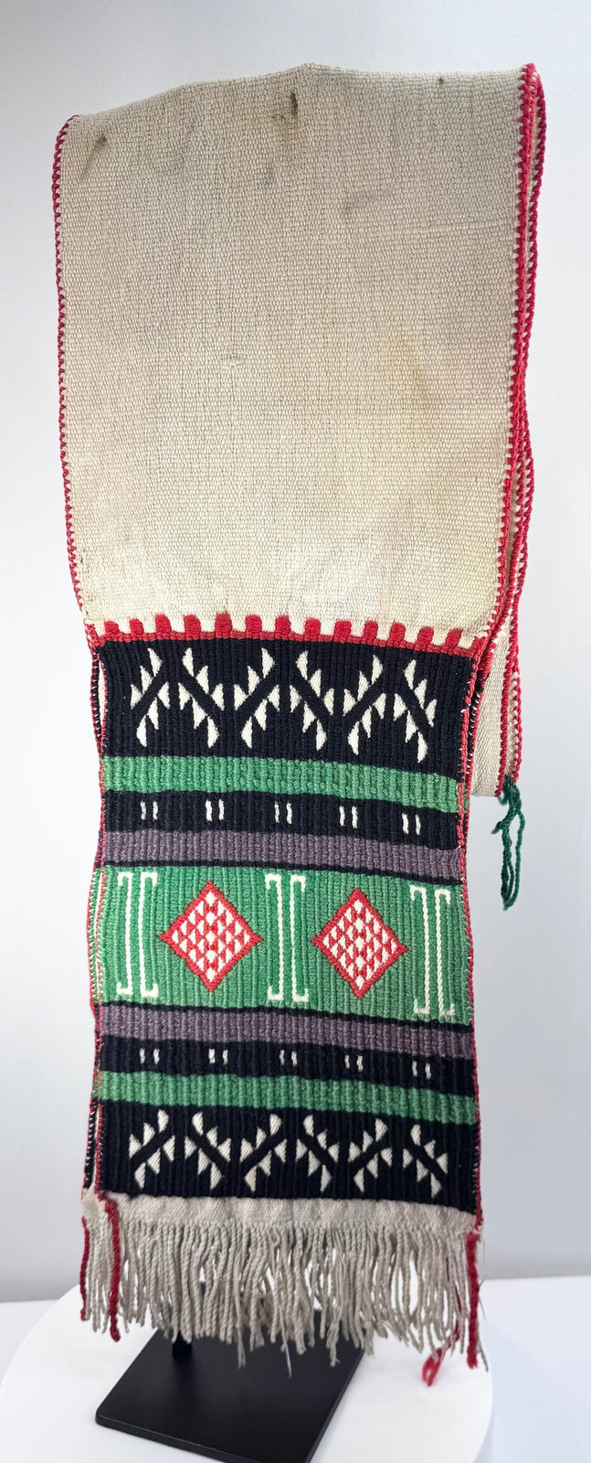 Full view of a cream-coloured Hopi-style dance sash measuring approximately 76 inches long